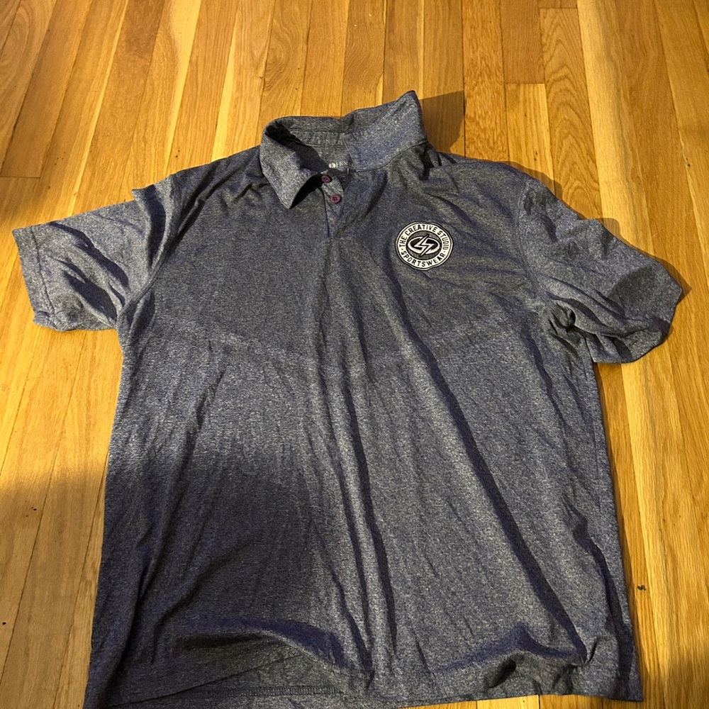 Used Men’s Holloway Bluish Polo Shirt with logo
Size Large